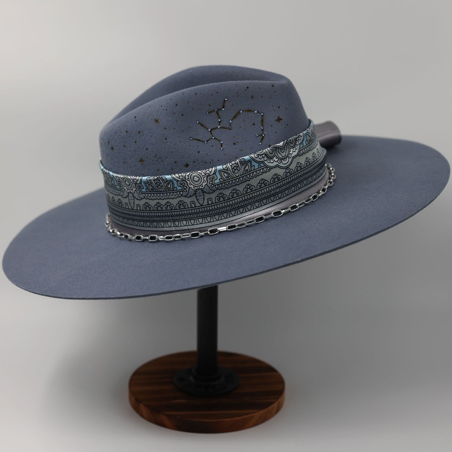 Handmade Sagittarius Blue Topaz birthstone hat. A meaningful zodiac gift with western, one-of-a-kind style.