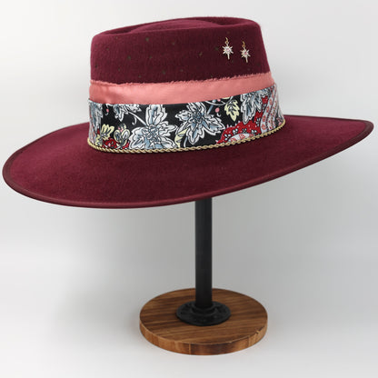 Handmade Capricorn garnet birthstone hat. A meaningful zodiac gift with western, one-of-a-kind style.