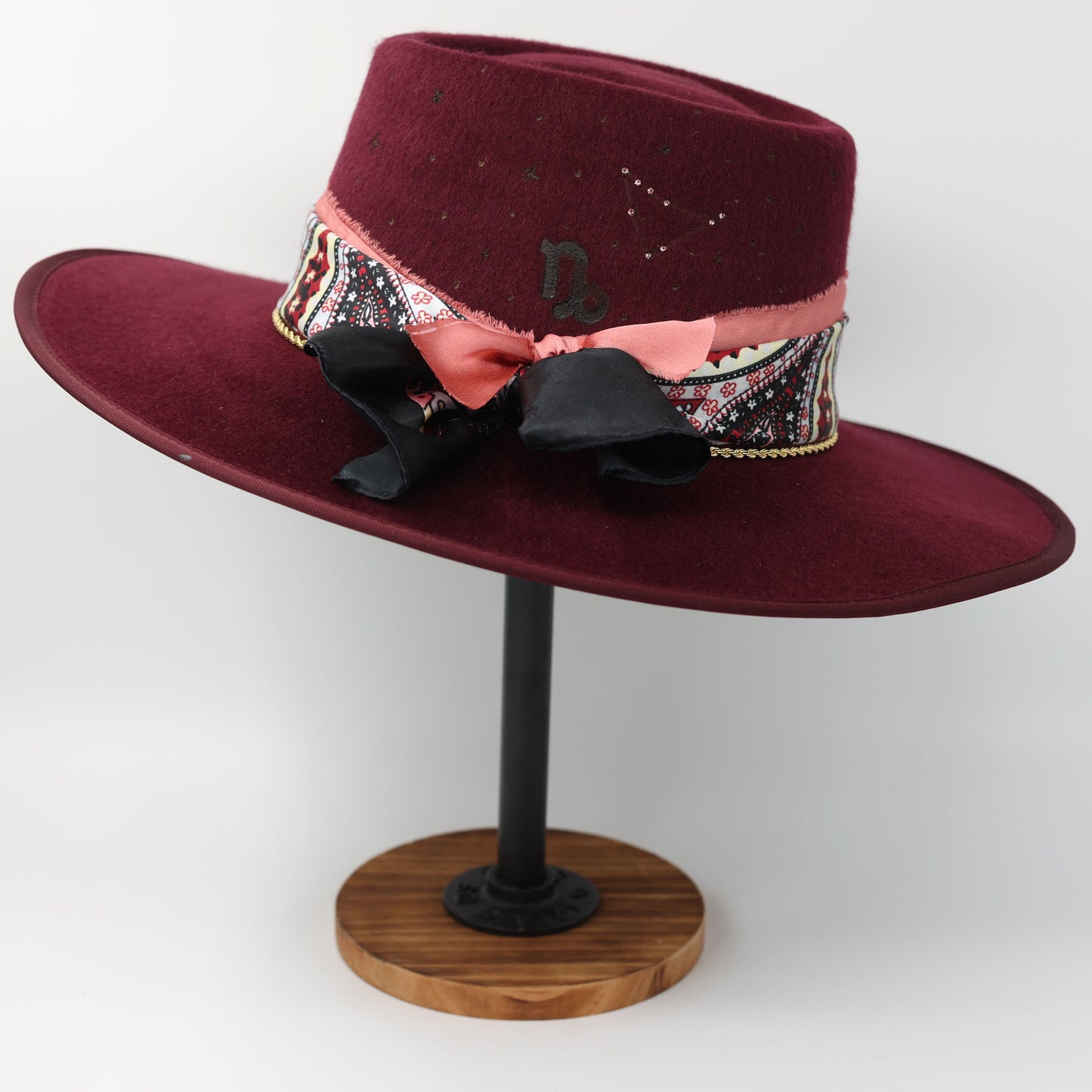 Handmade Capricorn garnet birthstone hat. A meaningful zodiac gift with western, one-of-a-kind style.