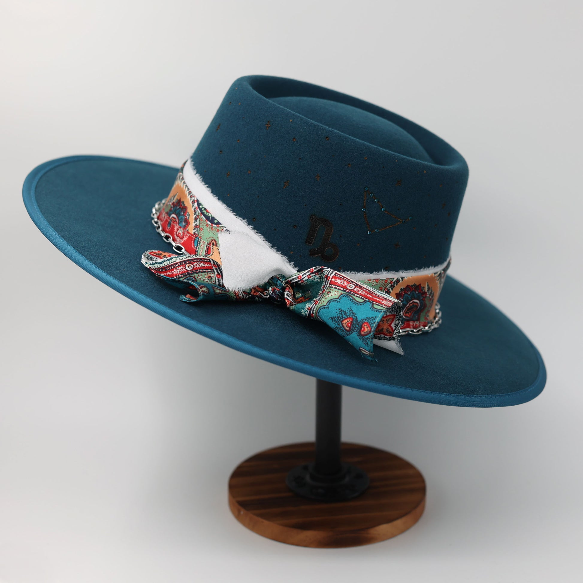 Handmade Capricorn Blue Topaz birthstone hat. A meaningful zodiac gift with western, one-of-a-kind style.