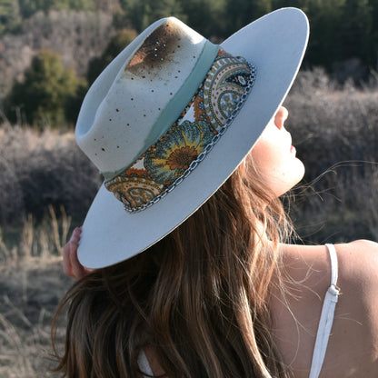 Handmade Leo peridot birthstone hat. A meaningful zodiac gift with western, one-of-a-kind style.