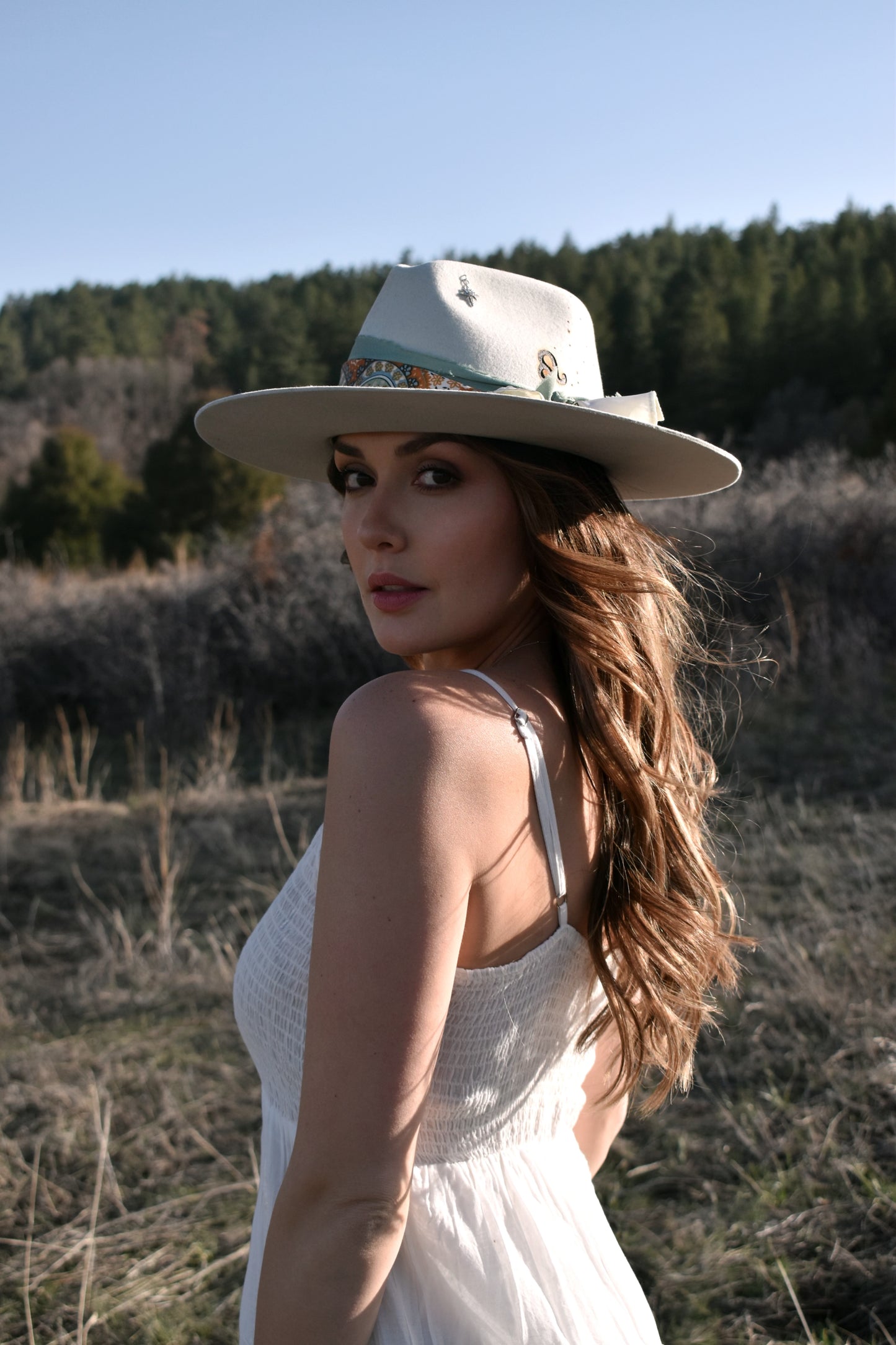 Handmade Leo peridot birthstone hat. A meaningful zodiac gift with western, one-of-a-kind style.