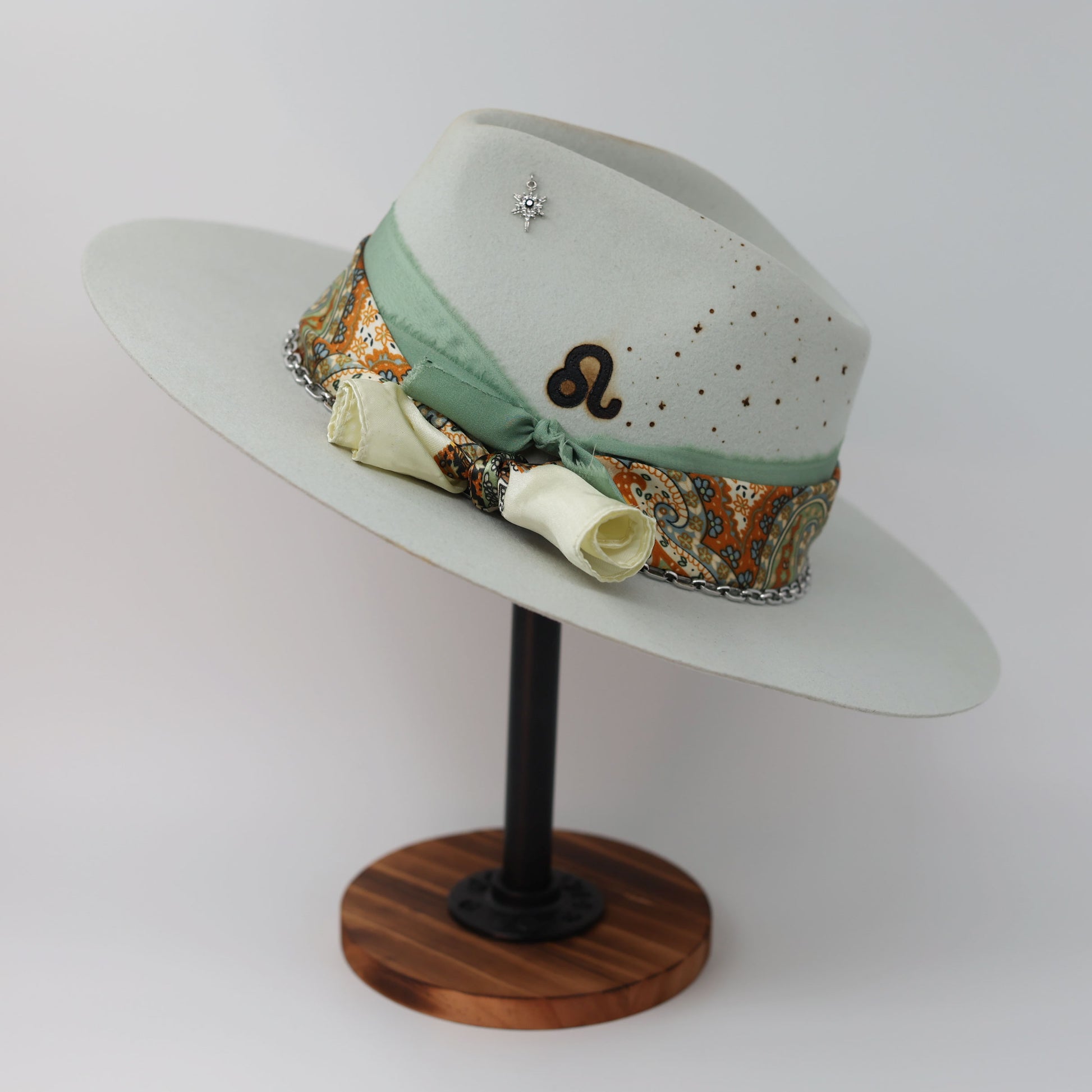 Handmade Leo peridot birthstone hat. A meaningful zodiac gift with western, one-of-a-kind style.