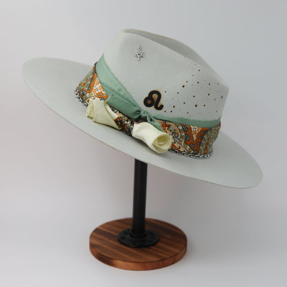 Handmade Leo peridot birthstone hat. A meaningful zodiac gift with western, one-of-a-kind style.