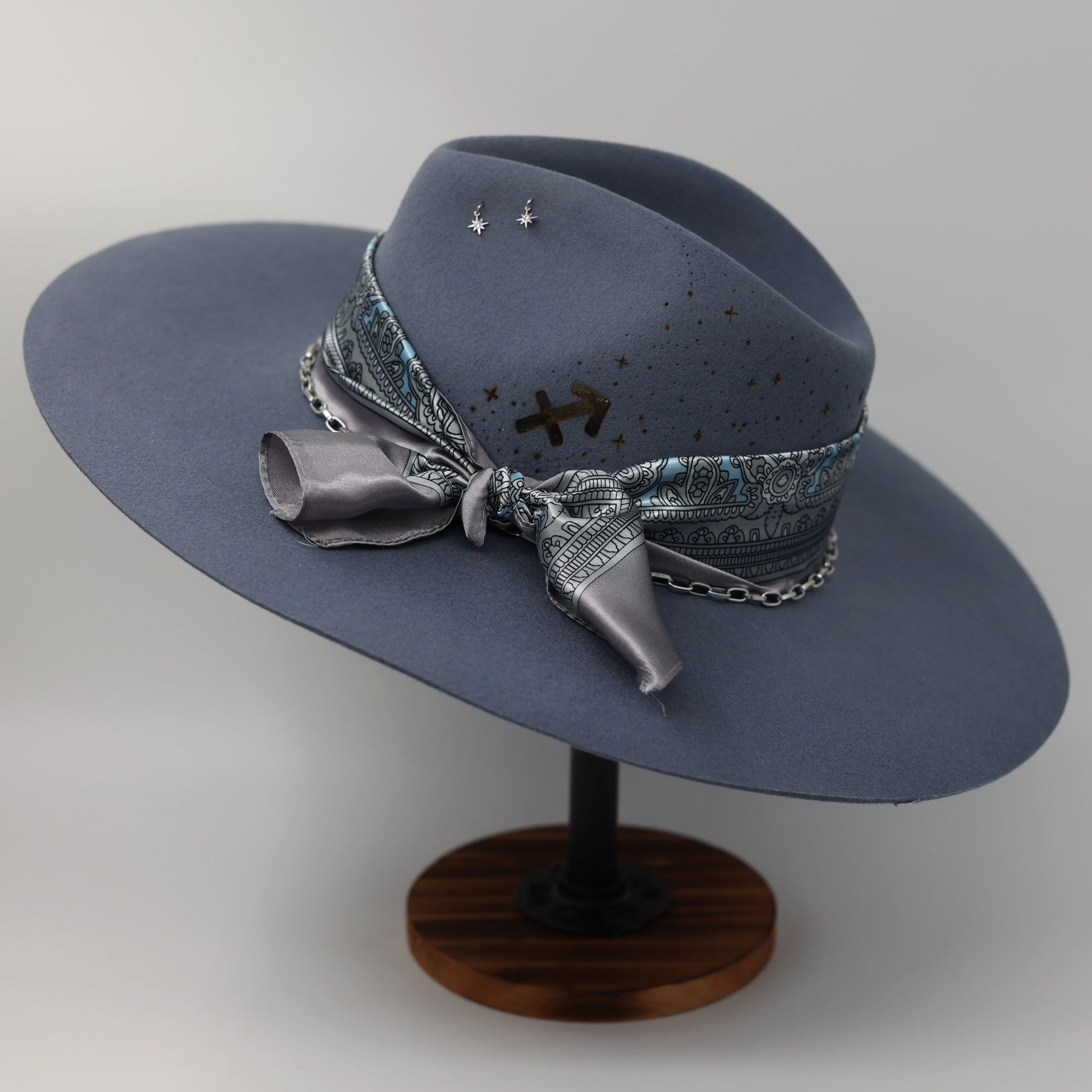 Handmade Sagittarius Blue Topaz birthstone hat. A meaningful zodiac gift with western, one-of-a-kind style.