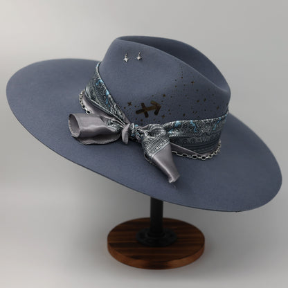 Handmade Sagittarius Blue Topaz birthstone hat. A meaningful zodiac gift with western, one-of-a-kind style.