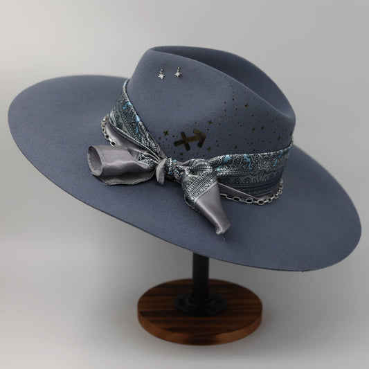 Handmade Sagittarius Blue Topaz birthstone hat. A meaningful zodiac gift with western, one-of-a-kind style.