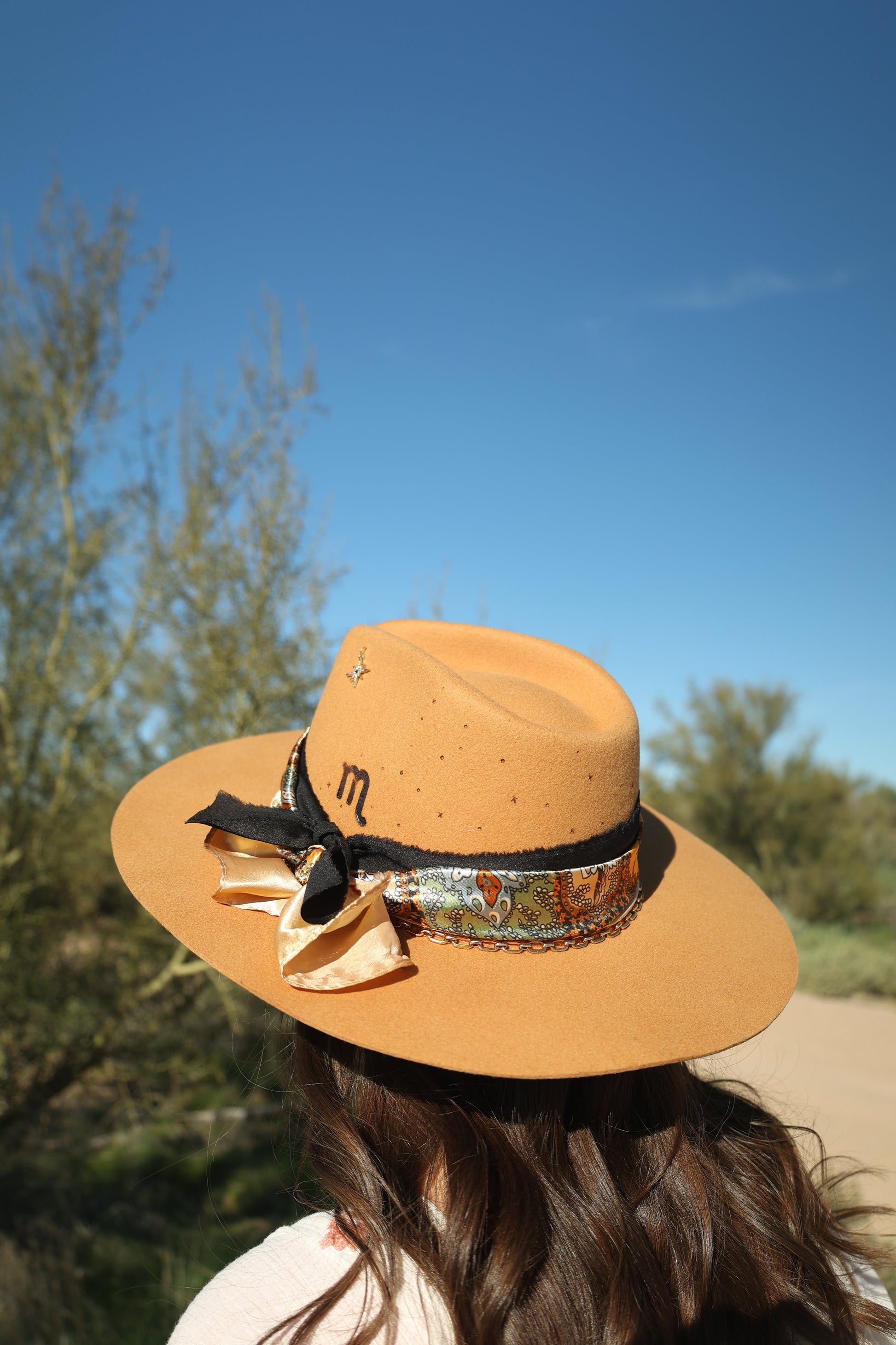Handmade Scorpio topaz birthstone hat. A meaningful zodiac gift with western, one-of-a-kind style.