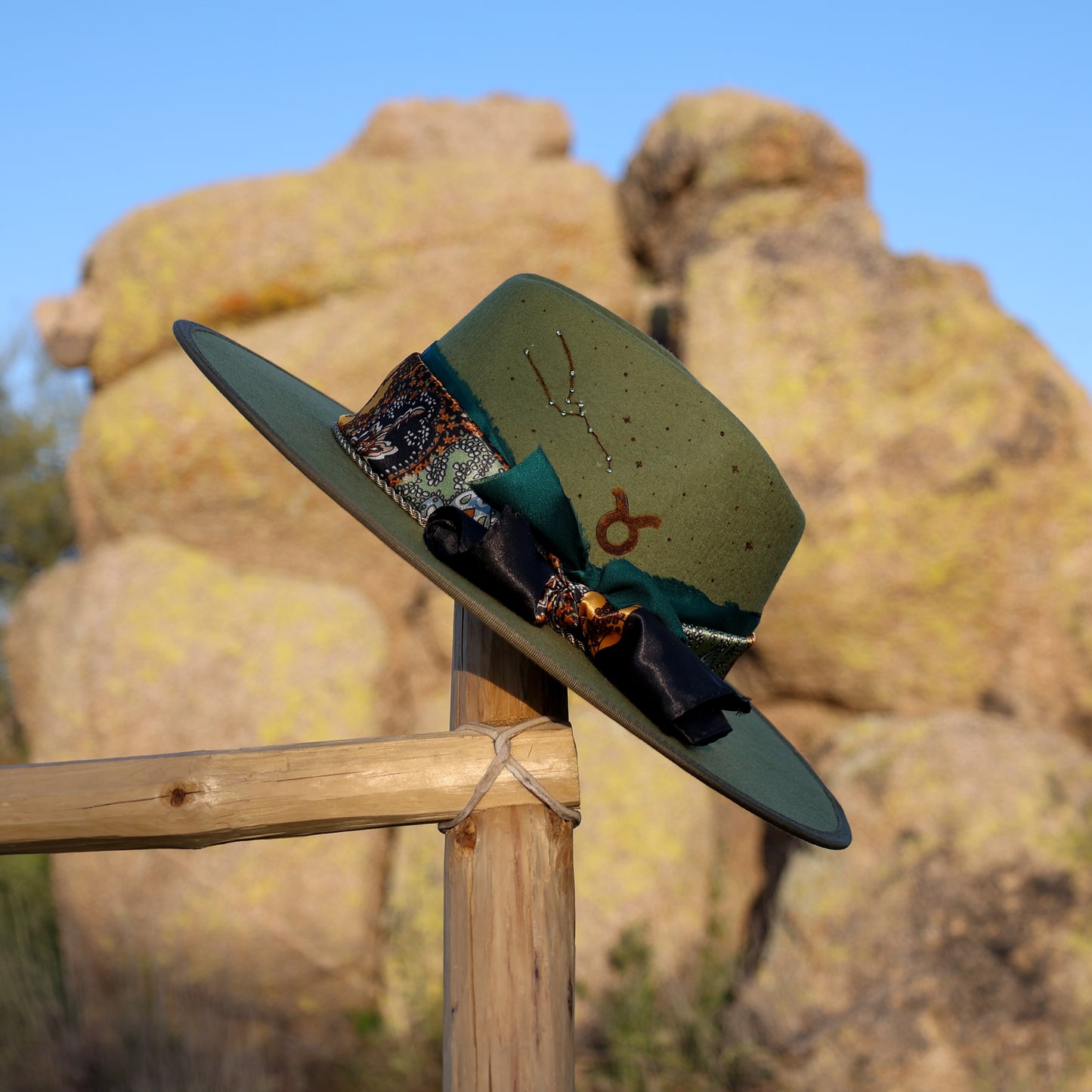 Handmade Taurus Emerald birthstone hat. A meaningful zodiac gift with western, one-of-a-kind style.