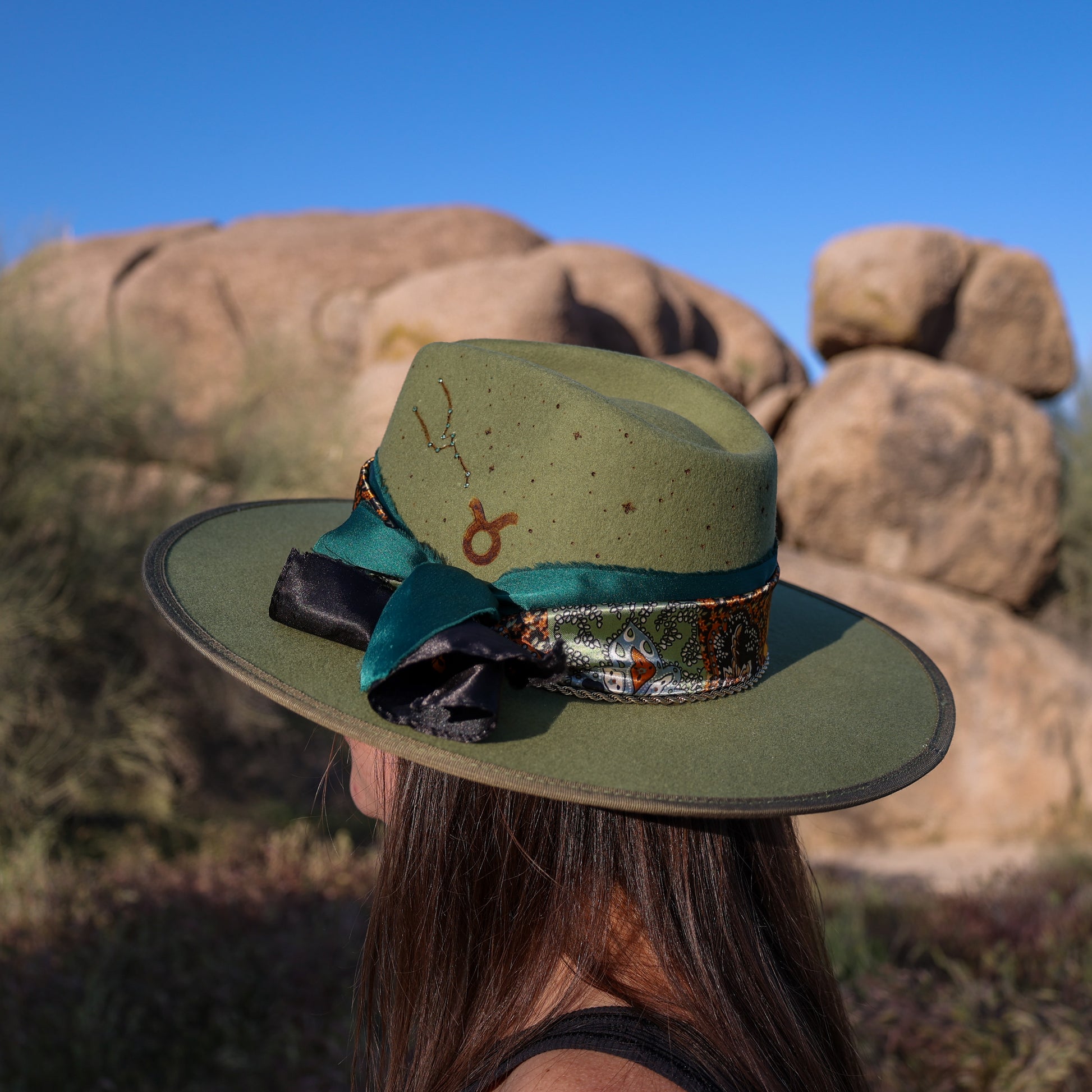 Handmade Taurus Emerald birthstone hat. A meaningful zodiac gift with western, one-of-a-kind style.