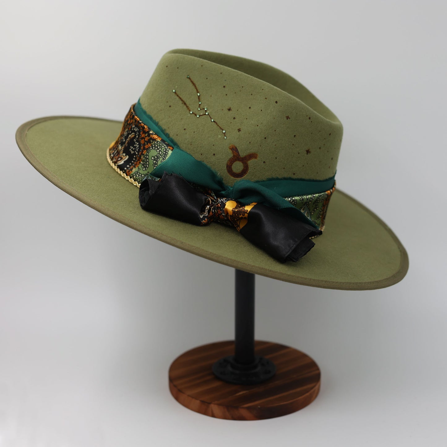 Handmade Taurus Emerald birthstone hat. A meaningful zodiac gift with western, one-of-a-kind style.