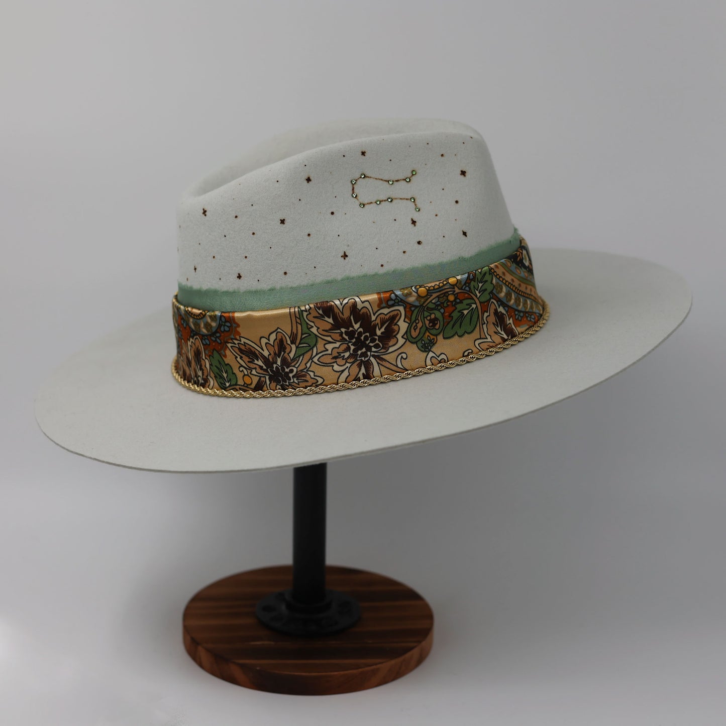 Handmade Taurus Emerald birthstone hat. A meaningful zodiac gift with western, one-of-a-kind style.